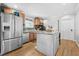 Bright kitchen with stainless steel appliances, center island with granite countertop, and ample storage at 240 Lamon Se Ave, Atlanta, GA 30316