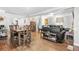 Open-concept living and dining area with hardwood floors and stylish furnishings at 240 Lamon Se Ave, Atlanta, GA 30316