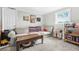 Comfortable living room with a gray sofa and a wooden coffee table at 240 Lamon Se Ave, Atlanta, GA 30316