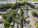 An aerial view of a community with mature trees near a highway, featuring well-maintained landscaping at 3326 Northcrest Rd # C, Atlanta, GA 30340