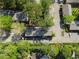 Aerial view features mature trees, manicured landscaping, and convenient parking within the neighborhood at 3326 Northcrest Rd # C, Atlanta, GA 30340
