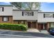 Charming townhome featuring brick accents, neutral siding, and mature landscaping at 3326 Northcrest Rd # C, Atlanta, GA 30340