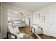 Open concept main bedroom with sitting area and large windows for an airy feel at 877 Pensive Run, Dacula, GA 30019