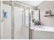 Shower room features a glass shower and soaking tub with a plant at 1299 Dunwoody Cv, Atlanta, GA 30338