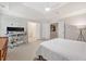 Bright primary bedroom with a workspace and ensuite bathrooms at 1299 Dunwoody Cv, Atlanta, GA 30338
