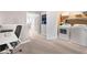 Convenient laundry room adjacent to an open space, equipped with modern washer and dryer at 1299 Dunwoody Cv, Atlanta, GA 30338