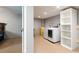 Basement laundry room with modern washer and dryer and shelving at 140 Maplewood Dr, Temple, GA 30179