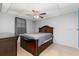 This basement bedroom has a large bed, wood floors and neutral colored walls at 140 Maplewood Dr, Temple, GA 30179
