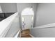 Upper view of the bright entryway with a white door, hardwood floors, and neutral walls at 140 Maplewood Dr, Temple, GA 30179