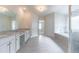 Large bathroom with double vanity, soaking tub, and stand-up shower at 1821 Silver Crest Way, Hoschton, GA 30548