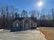 Community clubhouse with parking and outdoor pool at 1821 Silver Crest Way, Hoschton, GA 30548