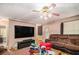 Cozy living room features hardwood floors, neutral walls, and a comfortable seating area at 365 Falling Timber Ct, Stockbridge, GA 30281