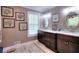 Elegant bathroom with granite countertops and dual sinks, offering ample space and style at 377 Lakeview Dr, Newborn, GA 30056
