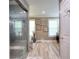 Modern bathroom featuring a tiled shower and a minimalist design creating a spa-like atmosphere at 377 Lakeview Dr, Newborn, GA 30056