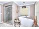 Stylish bathroom with a soaking tub and a glass-enclosed shower, perfect for relaxation and comfort at 377 Lakeview Dr, Newborn, GA 30056