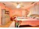 Well-lit bedroom with unique decor and wood flooring at 377 Lakeview Dr, Newborn, GA 30056