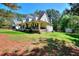 Charming two-story home with a welcoming front porch and spacious front yard at 377 Lakeview Dr, Newborn, GA 30056