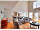Open concept living room with kitchen and breakfast nook beyond at 377 Lakeview Dr, Newborn, GA 30056