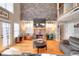Inviting living room featuring a stone fireplace and hardwood floors at 377 Lakeview Dr, Newborn, GA 30056