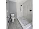 Bathroom with tiled walk-in shower and modern fixtures at 760 Whitehall Way, Roswell, GA 30076