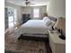Bedroom with ceiling fan, wood floors, and neutral decor at 760 Whitehall Way, Roswell, GA 30076