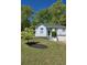 Charming home with a well-manicured lawn, attached garage and inviting entryway at 760 Whitehall Way, Roswell, GA 30076
