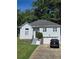 Charming home with a well-manicured lawn, classic design, and a convenient attached garage at 760 Whitehall Way, Roswell, GA 30076