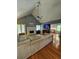 Spacious living area features a fireplace, TV, and hardwood floors at 760 Whitehall Way, Roswell, GA 30076