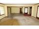 Open-concept living room featuring yellow walls and views into adjacent rooms, showing an open floor plan at 811 Verde Dr, Riverdale, GA 30274