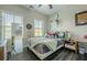 Bright bedroom with dual windows, stylish decor, and a comfortable layout at 3877 Via Cima Ln, Suwanee, GA 30024