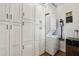 Bright laundry room with stackable washer and dryer, great storage and great lighting at 391 Collier Nw Rd, Atlanta, GA 30309