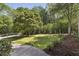 This backyard putting green is surrounded by mature landscaping and offers endless hours of fun and relaxation at 391 Collier Nw Rd, Atlanta, GA 30309