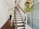 Inviting foyer with hardwood floors and staircase at 605 Stone Field Nw Run, Marietta, GA 30060