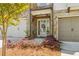 Inviting home entrance with brick accents, a decorative wreath, and a well-manicured garden at 605 Stone Field Nw Run, Marietta, GA 30060