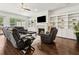 Cozy living room with fireplace, custom built-ins, and a comfortable seating arrangement at 605 Stone Field Nw Run, Marietta, GA 30060
