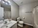 Clean bathroom with a shower/tub and a large mirror at 7235 Hummingbird Ln, Winston, GA 30187