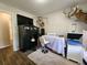 Eclectic office space featuring unique décor and wood-look floors at 7235 Hummingbird Ln, Winston, GA 30187