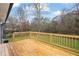 Newly refinished back deck overlooking level backyard at 9148 Homewood Dr, Riverdale, GA 30274
