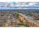 Aerial view of the neighborhood, showcasing the homes, trees, and surrounding cityscape at 933 Dell Se Ave, Smyrna, GA 30080