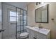 Modern bathroom featuring tiled floors and shower, updated vanity, and stylish fixtures at 933 Dell Se Ave, Smyrna, GA 30080