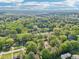 An aerial view showcases the community surrounded by lush greenery and landscape, illustrating a peaceful environment at 1596 Pontiac Se Pl, Atlanta, GA 30315