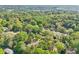 An aerial shot reveals the property's setting within a tranquil, tree-filled neighborhood at 1596 Pontiac Se Pl, Atlanta, GA 30315