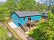 This backyard features a wood deck, stairs and an expansive grassy area at 1596 Pontiac Se Pl, Atlanta, GA 30315