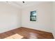 Bedroom with hardwood floors, a modern ceiling fan, and a window with natural light at 1596 Pontiac Se Pl, Atlanta, GA 30315