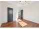 Bedroom featuring beautiful hardwood floors and a view into the next room at 1596 Pontiac Se Pl, Atlanta, GA 30315