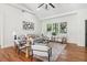 Bright living room with vaulted ceilings, hardwood floors, and modern furniture at 1596 Pontiac Se Pl, Atlanta, GA 30315