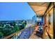 Relax on the balcony with seating and enjoy city views from this luxurious condo at 2233 Peachtree Ne Rd # 1207, Atlanta, GA 30309
