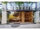 Grand entrance to The Astoria with glass doors and elegant architectural details at 2233 Peachtree Ne Rd # 1207, Atlanta, GA 30309