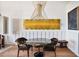 Dining room featuring a modern table with seating complemented by unique wall decor and lighting at 2233 Peachtree Ne Rd # 1207, Atlanta, GA 30309