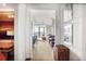 Hallway showcasing an open floor plan with views into the living and dining areas beyond at 2233 Peachtree Ne Rd # 1207, Atlanta, GA 30309